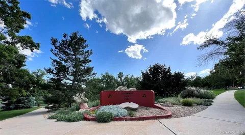 a picture of a park with bench and white walls