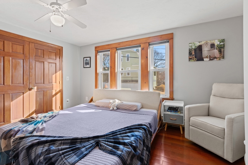 41 Baker Avenue Lexington, MA 02421 - Photo 15 of 21 a bedroom with a bed couch and window