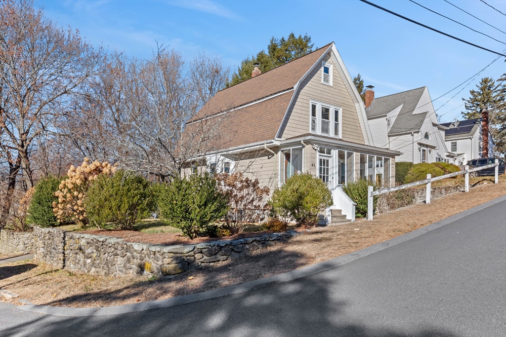 41 Baker Avenue Lexington, MA 02421 - Photo 2 of 21 a front view of a house with a yard