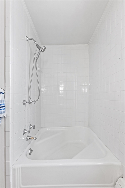 41 Baker Avenue Lexington, MA 02421 - Photo 6 of 21 a bathroom with a bathtub