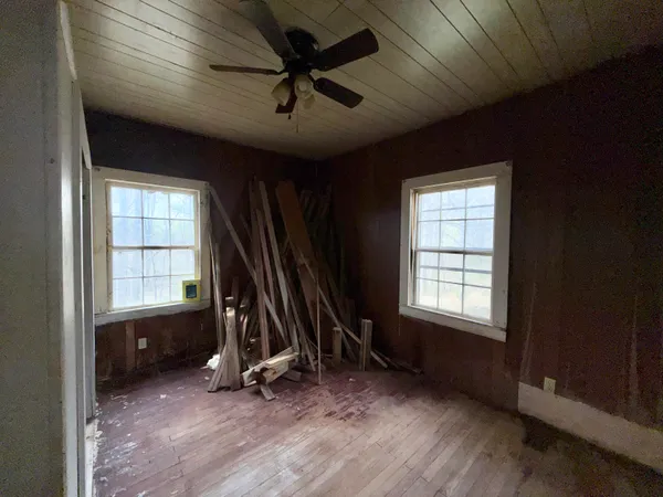 an empty room with windows