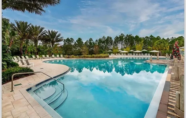 a view of a lake with a yard