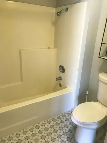 a view of a door in front of a house