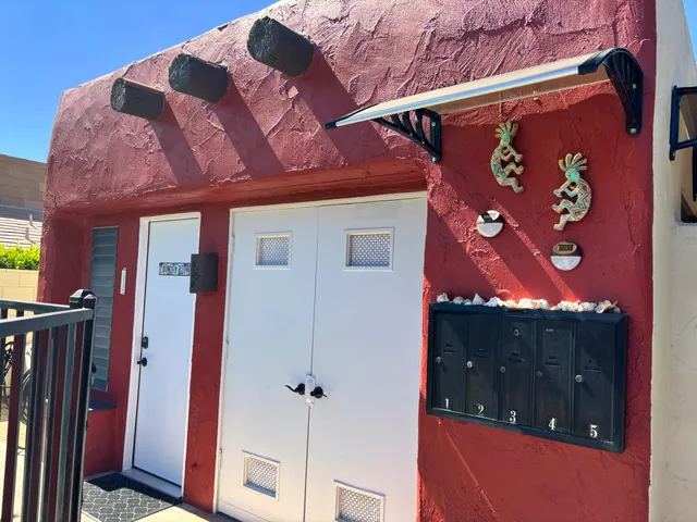 a view of a houses with a balcony