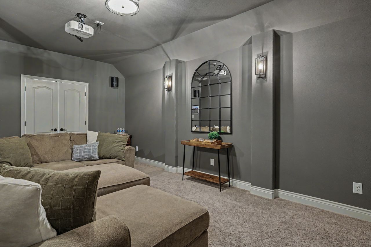 809 Prairie Dunes Drive Georgetown, TX 78628 - Photo 27 of 40 Indulge in cinematic experiences within this dedicated media room.