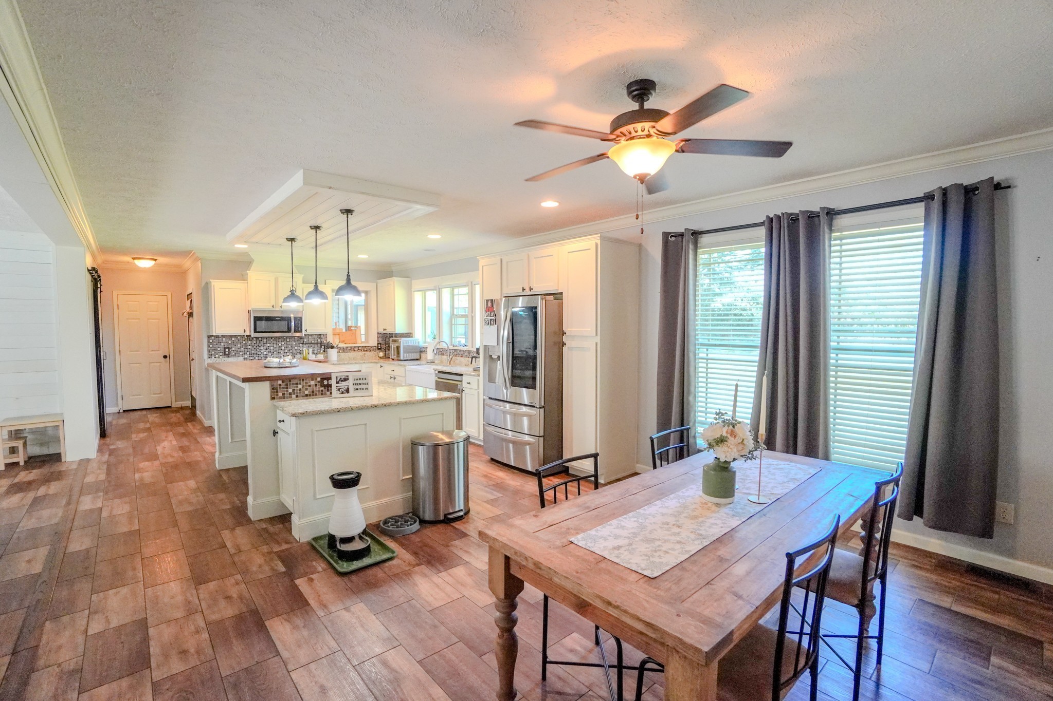 137 Hawkins Road Westmoreland, TN 37186 - Photo 38 of 71 a view of kitchen with cabinets and wooden floor
