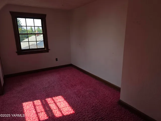 an empty room with a window