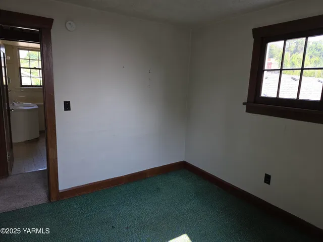 an empty room with a window