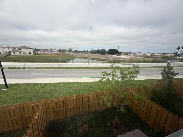 a view of a lake with a city