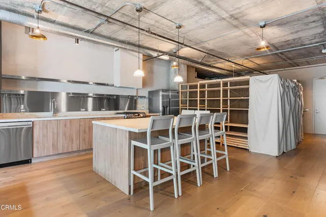 a view of a large room with windows