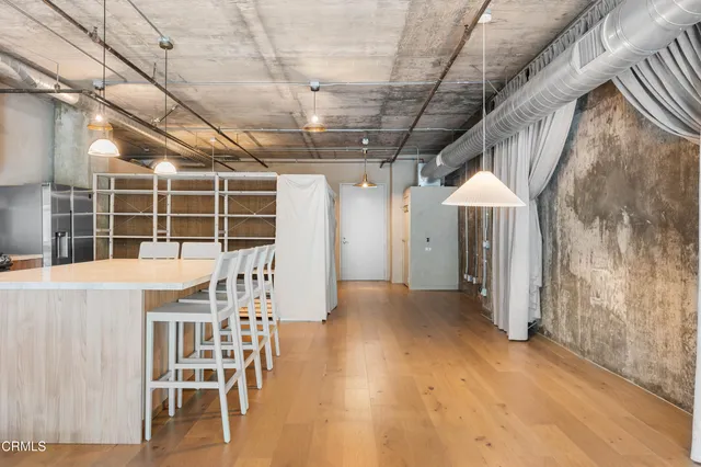 a view of a chairs and table in a room