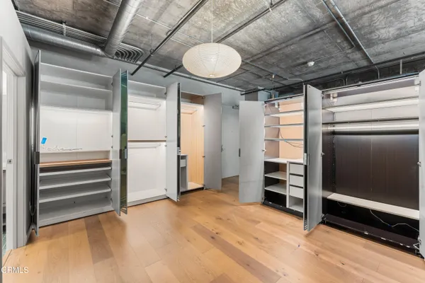 a view of room with wooden floor