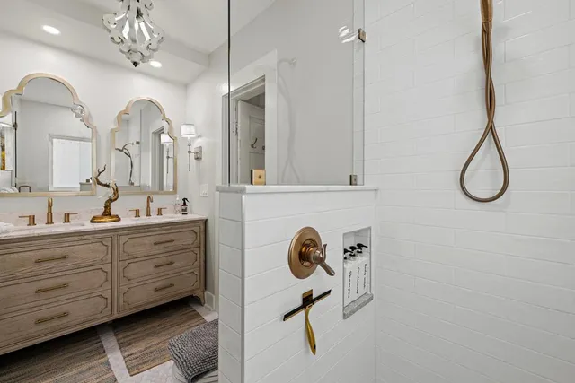 a bathroom with a tub and shower