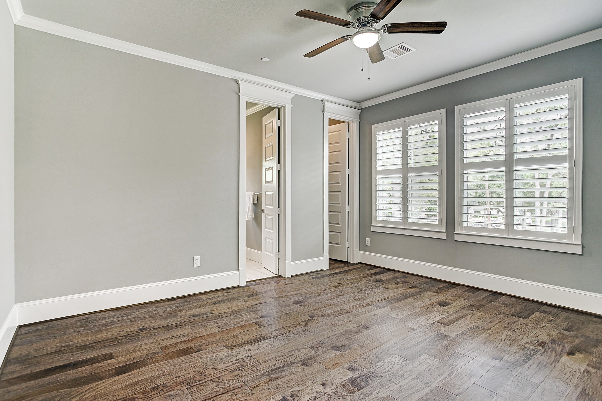 325 Bunker Hill Road Houston, TX 77024 - Photo 37 of 50 a view of an empty room with wooden floor and a window