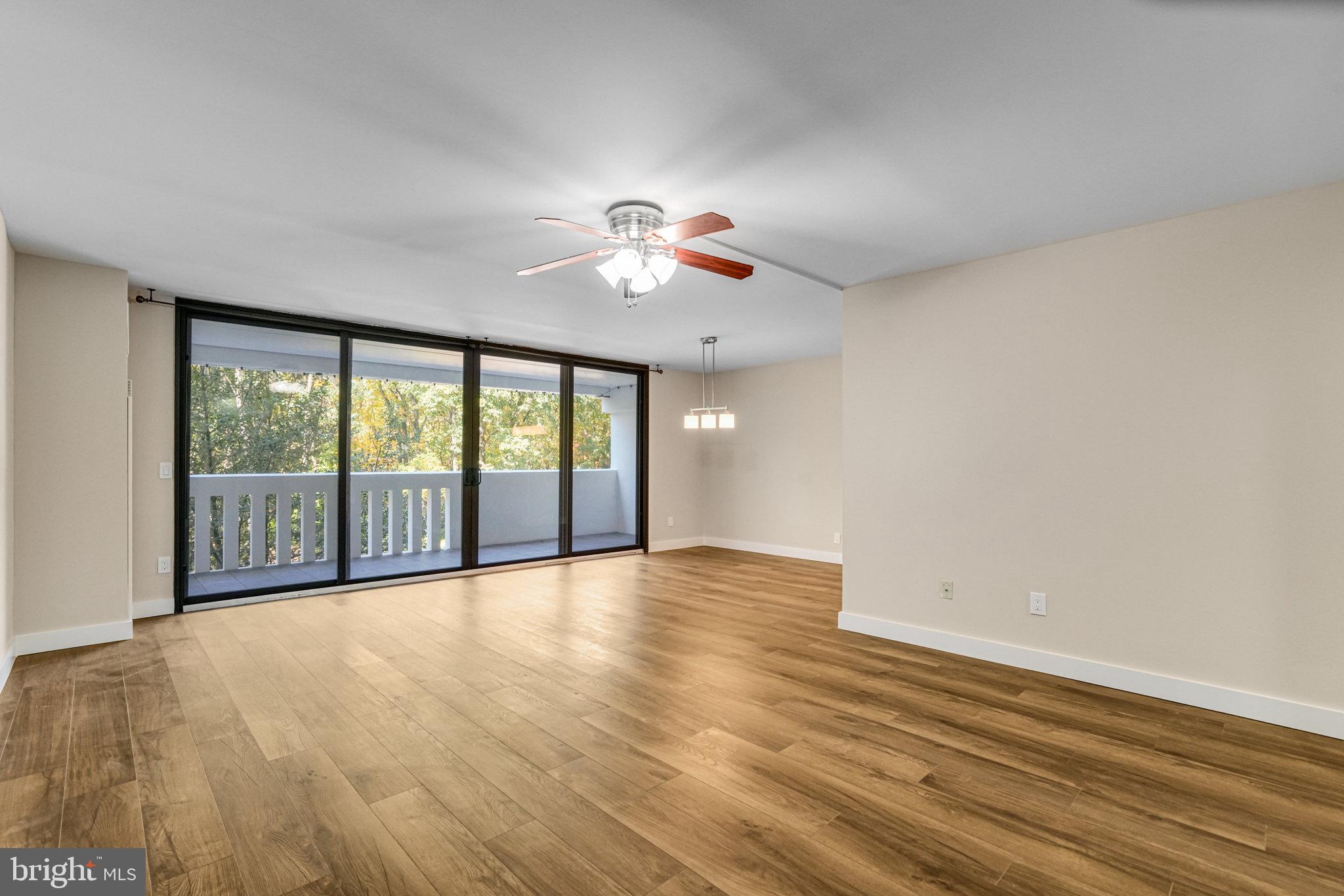 6101 Edsall Road, Unit 312 Alexandria, VA 22304 - Photo 2 of 57 wooden floor in an empty room with a window