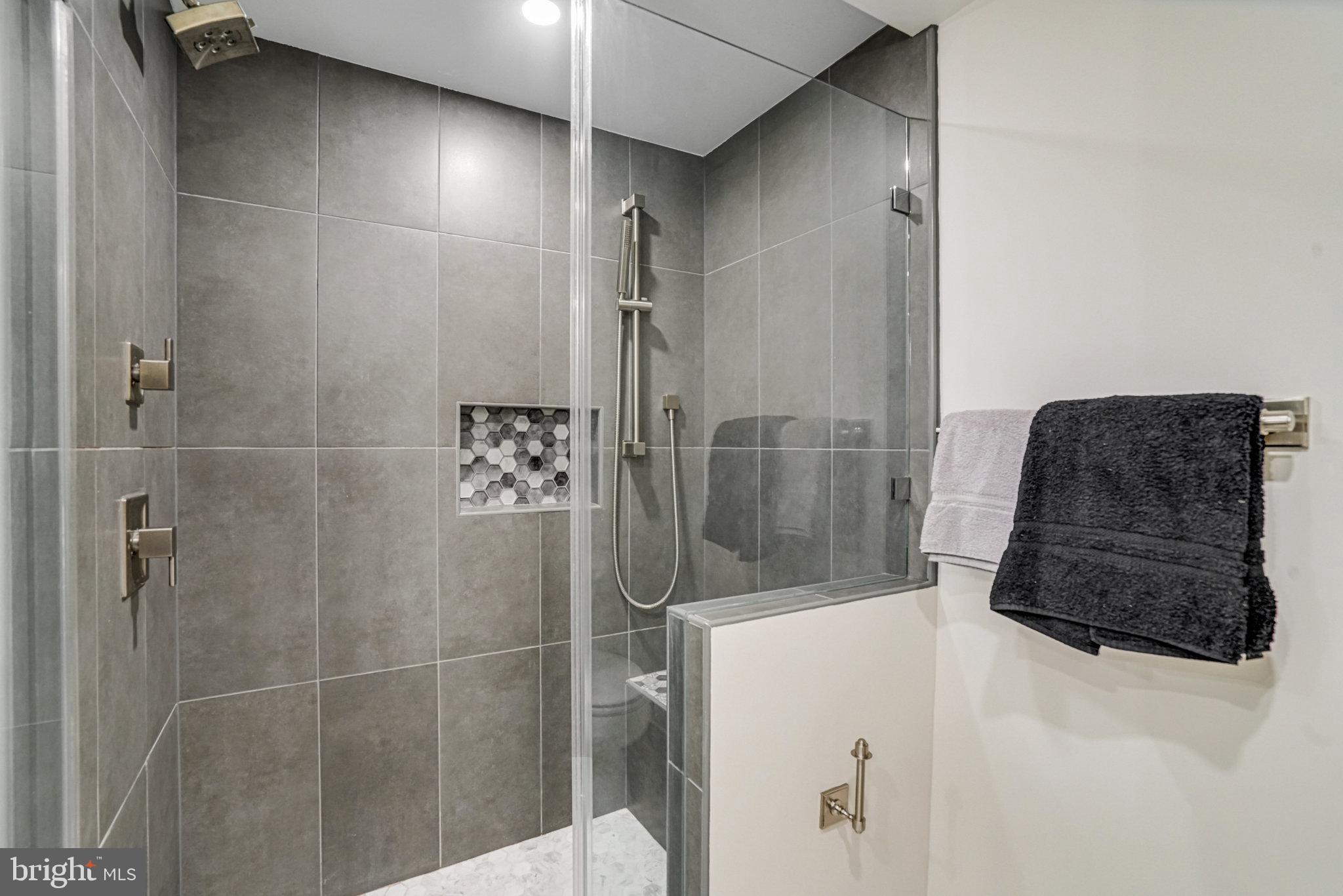 6101 Edsall Road, Unit 312 Alexandria, VA 22304 - Photo 22 of 57 a bathroom with a shower