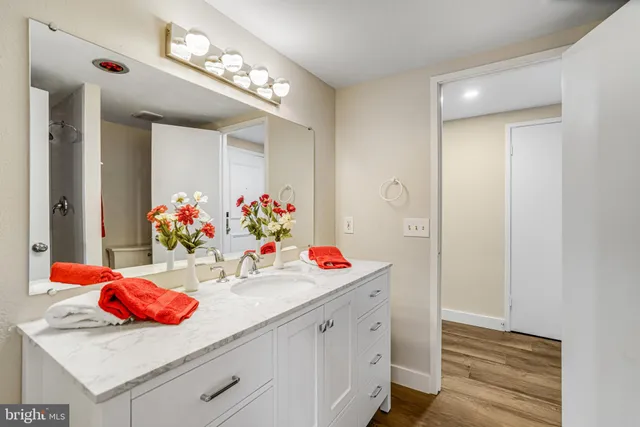 a view of a hallway kitchen