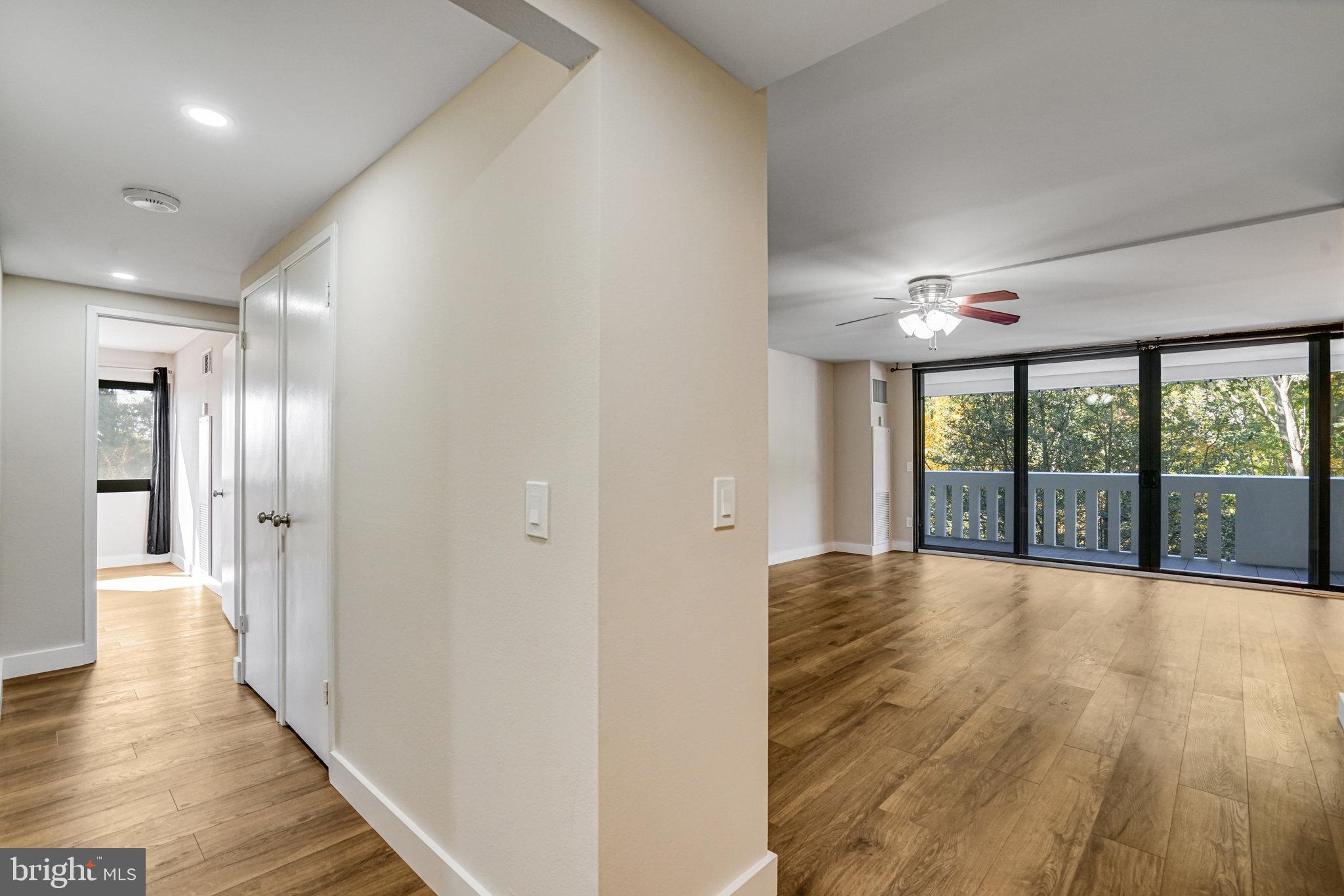 6101 Edsall Road, Unit 312 Alexandria, VA 22304 - Photo 8 of 57 a view of a big room with wooden floor and windows