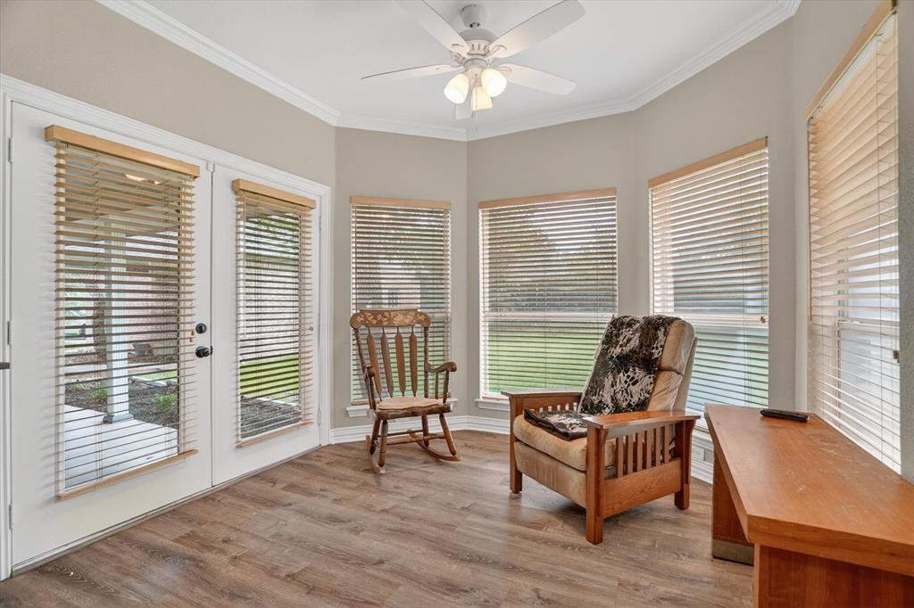 309 Verde Road Willow Park, TX 76087 - Photo 18 of 38 Sitting area in the primary bedroom, overlooking the backyard.