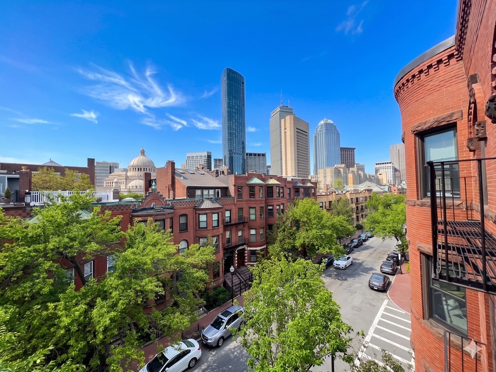 198 St Botolph Street, Unit 8 Boston, MA 02115 - Photo 5 of 7 a view of a city with tall buildings