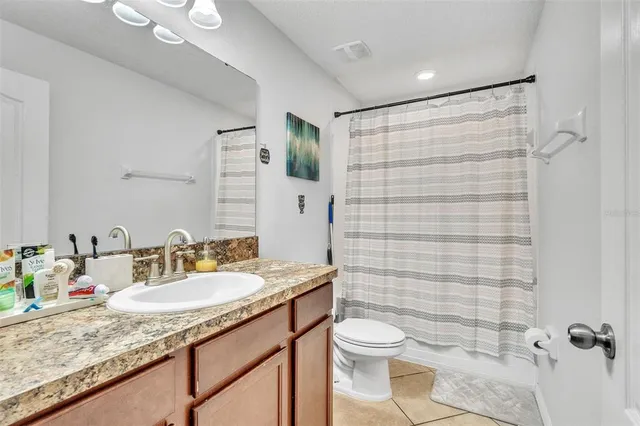 a room with a bed and a desk