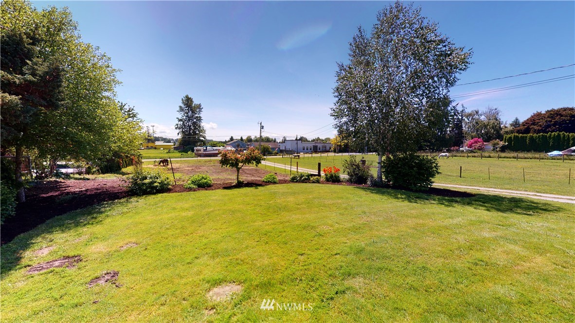17815 Dunbar Road Mount Vernon, WA 98273 - Photo 29 of 29 a front view of a house with a yard and trees