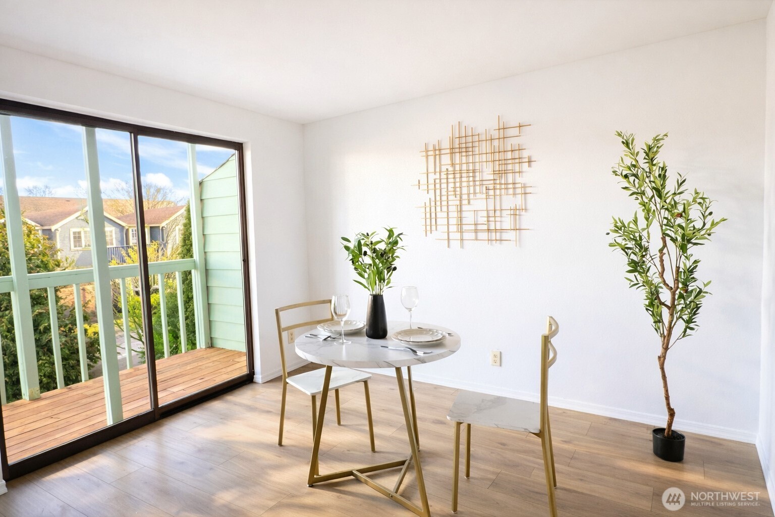 318 South 174th Place, Unit K Burien, WA 98148 - Photo 3 of 12 a view of a livingroom with furniture and a potted plant