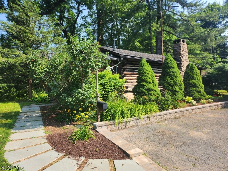 374 Rte 24 Chester, NJ 07930 - Photo 2 of 15 a view of a pathway both side of house