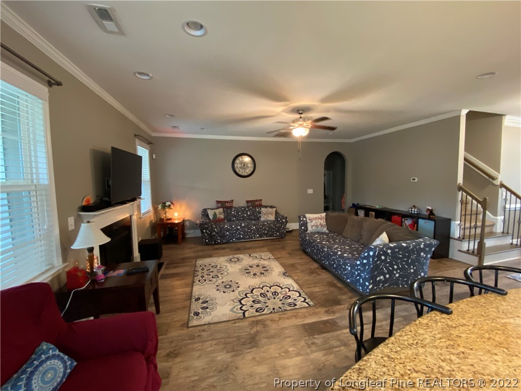144 Moultrie Lane Aberdeen, NC 28315 - Photo 16 of 49 a living room with furniture and a flat screen tv