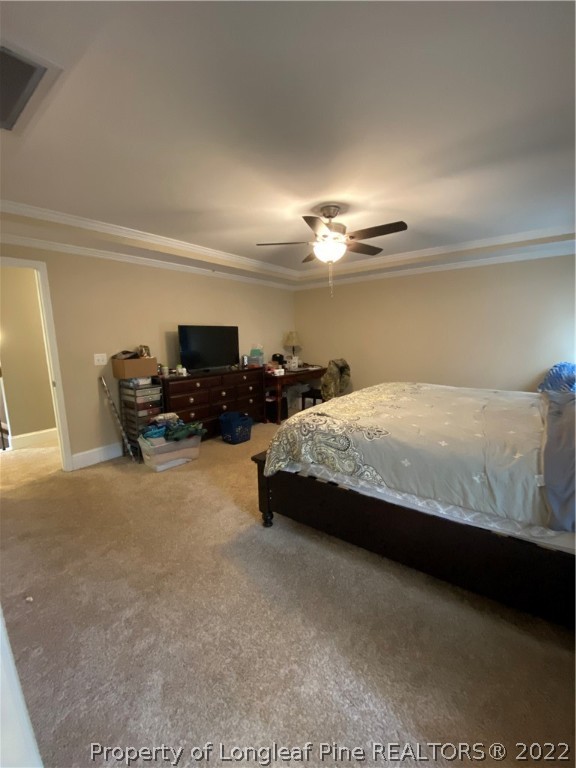 144 Moultrie Lane Aberdeen, NC 28315 - Photo 25 of 49 a bedroom with a bed and lamp