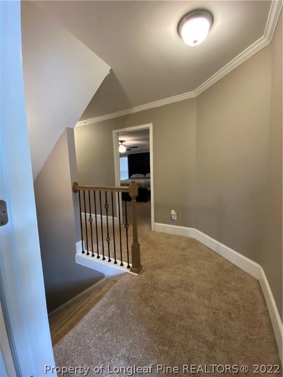 144 Moultrie Lane Aberdeen, NC 28315 - Photo 34 of 49 an entryway in a hall with wooden floor