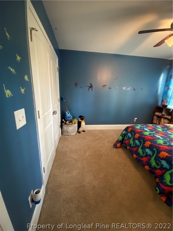 144 Moultrie Lane Aberdeen, NC 28315 - Photo 36 of 49 a bed room with a bed