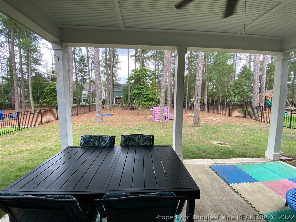 144 Moultrie Lane Aberdeen, NC 28315 - Photo 48 of 49 a view of outdoor sitting space with backyard