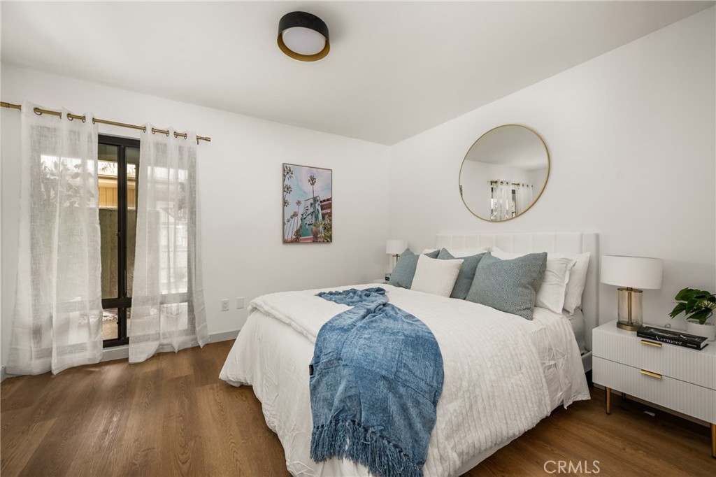 3010 Associated Road, Unit 122 Fullerton, CA 92835 - Photo 6 of 17 a bedroom with bed and a window