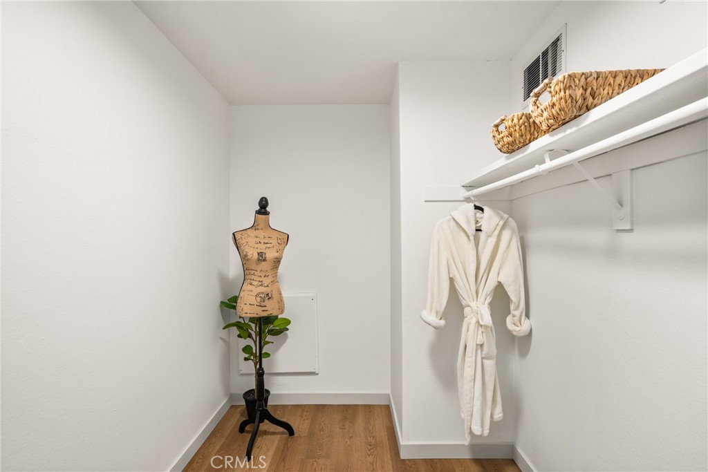 3010 Associated Road, Unit 122 Fullerton, CA 92835 - Photo 9 of 17 a view of entryway with wooden floor