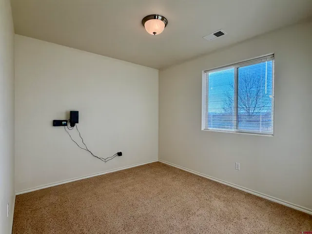 a view of a room with an empty space