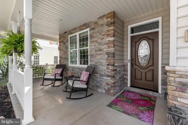a spacious bedroom with a bed and a window