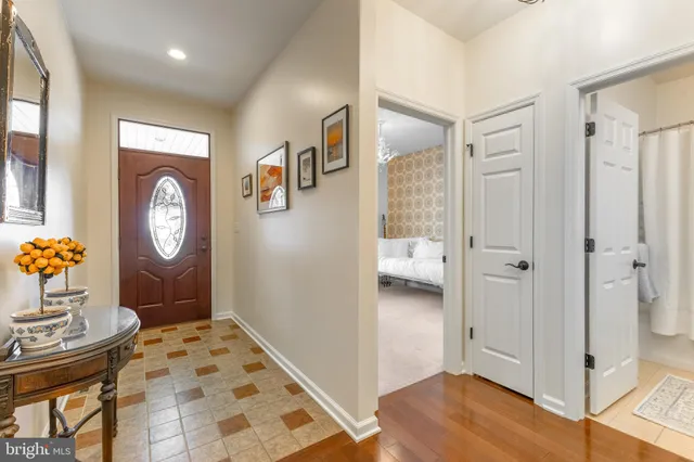a bathroom with a toilet a sink and curtain