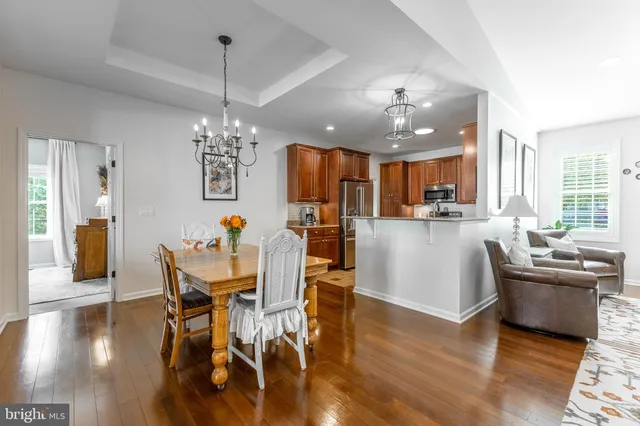a kitchen with a sink cabinets and window