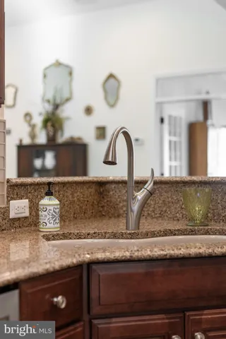 a close view of sink and a mirror