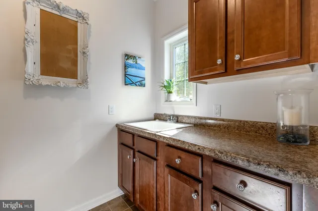 a bed room with a bed and a window