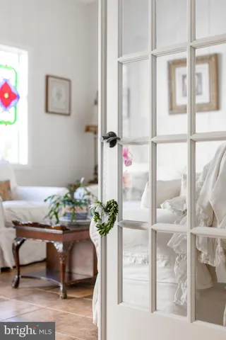 a bathroom with a glass shower door