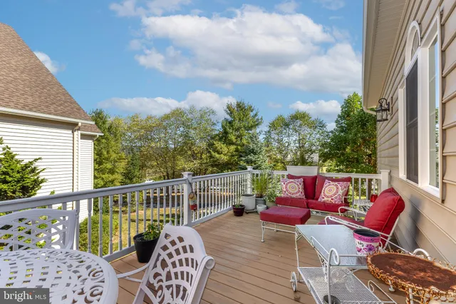a kitchen with stainless steel appliances and wooden cabinets