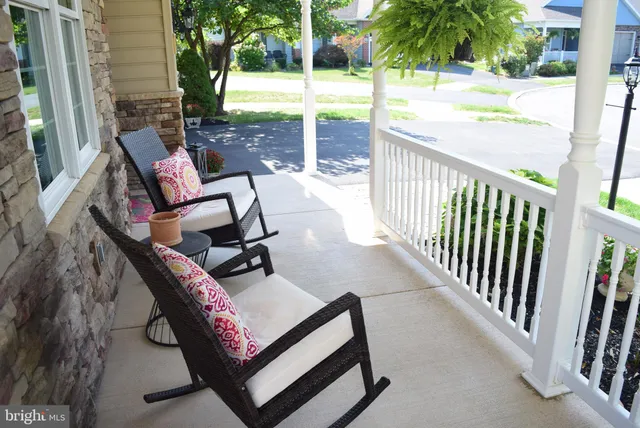 a view of a patio with swimming pool
