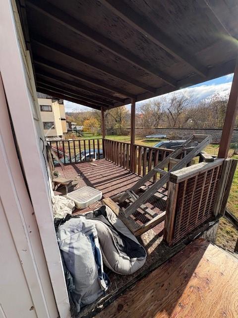 36 Main Street Brownsville, PA 15417 - Photo 13 of 15 a view of a roof deck with couches and wooden fence