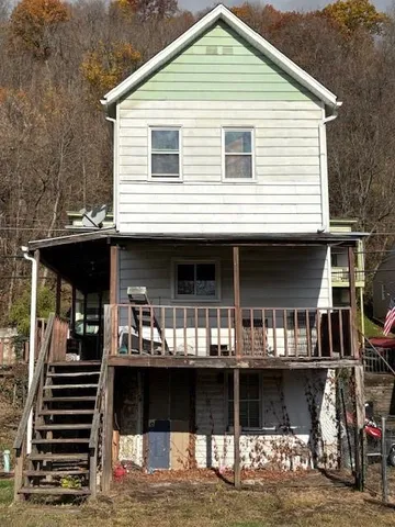 a front view of a house with balcony