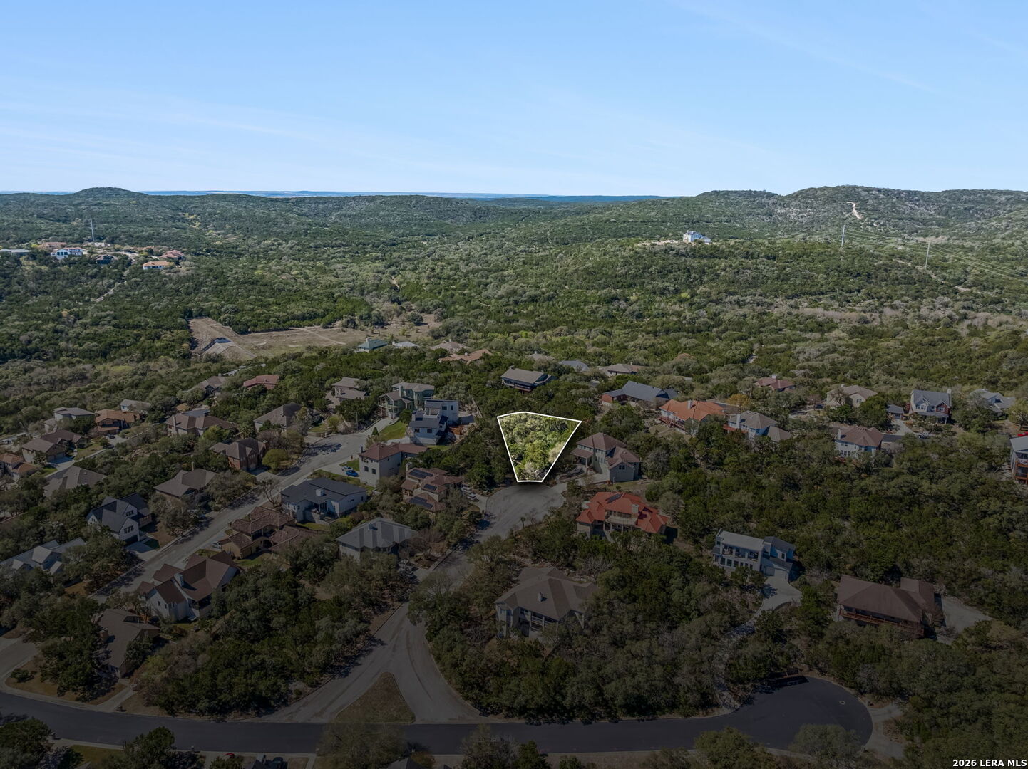 11232 Cave Creek Helotes, TX 78023 - Photo 2 of 9 a view of a city with lush green forest