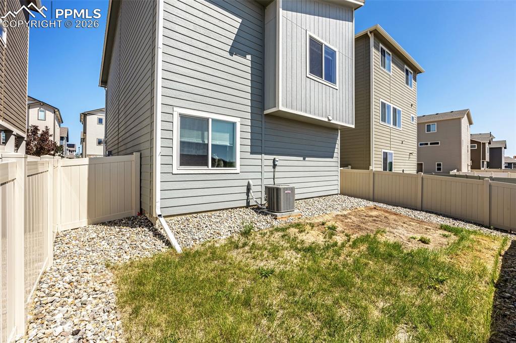 4432 Samaritan Loop Colorado Springs, CO 80916 - Photo 3 of 20 a backyard of a house