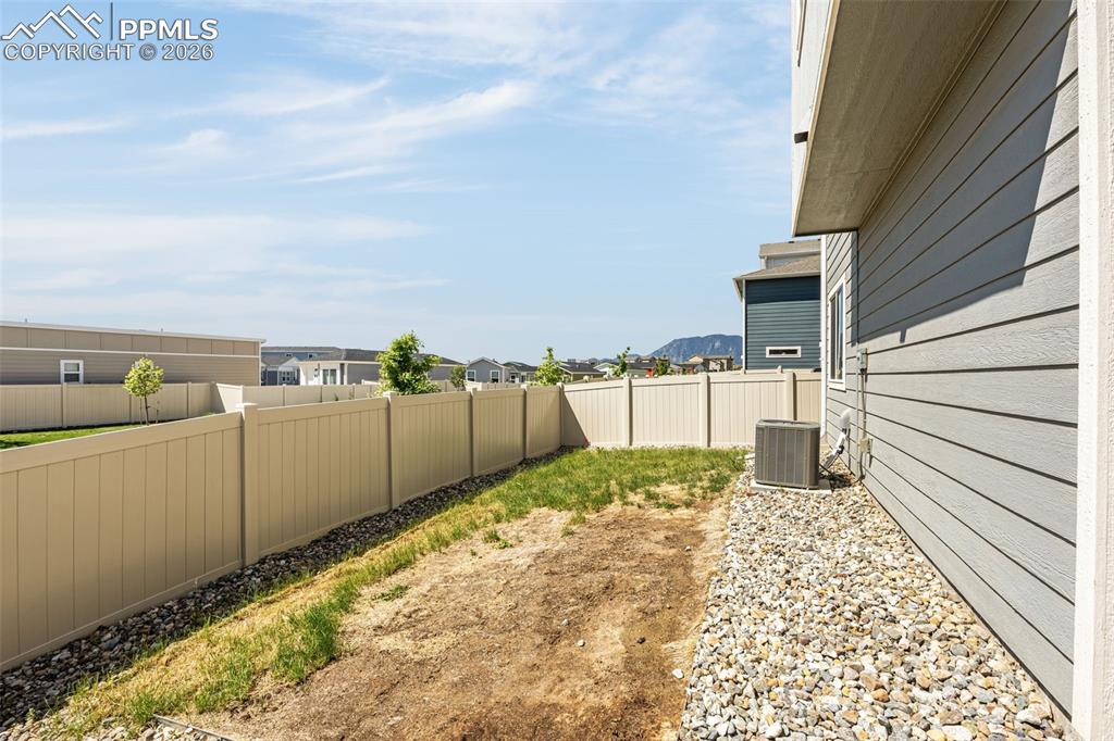 4432 Samaritan Loop Colorado Springs, CO 80916 - Photo 4 of 20 a view of a backyard