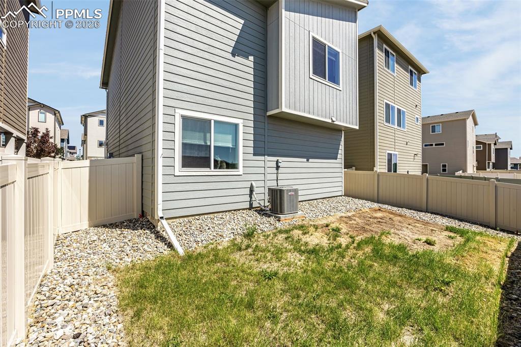 4432 Samaritan Loop Colorado Springs, CO 80916 - Photo 5 of 20 a backyard of a house